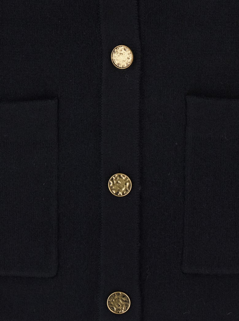 black crewneck wool cardigan with pockets by Selfnex
