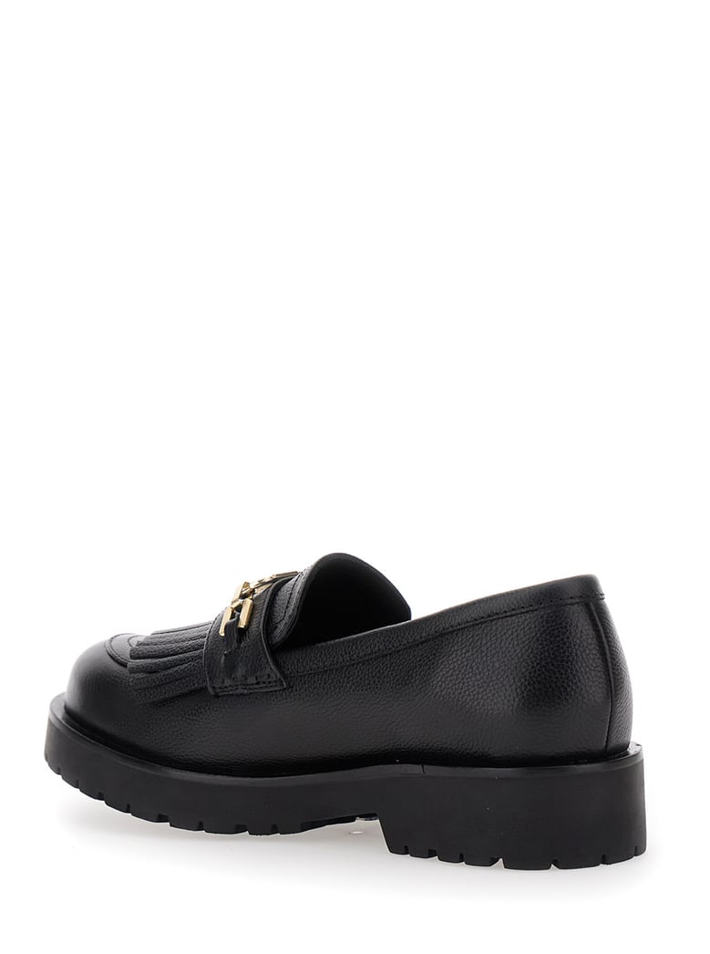 black leather loafers with chunky platform by Selfnex