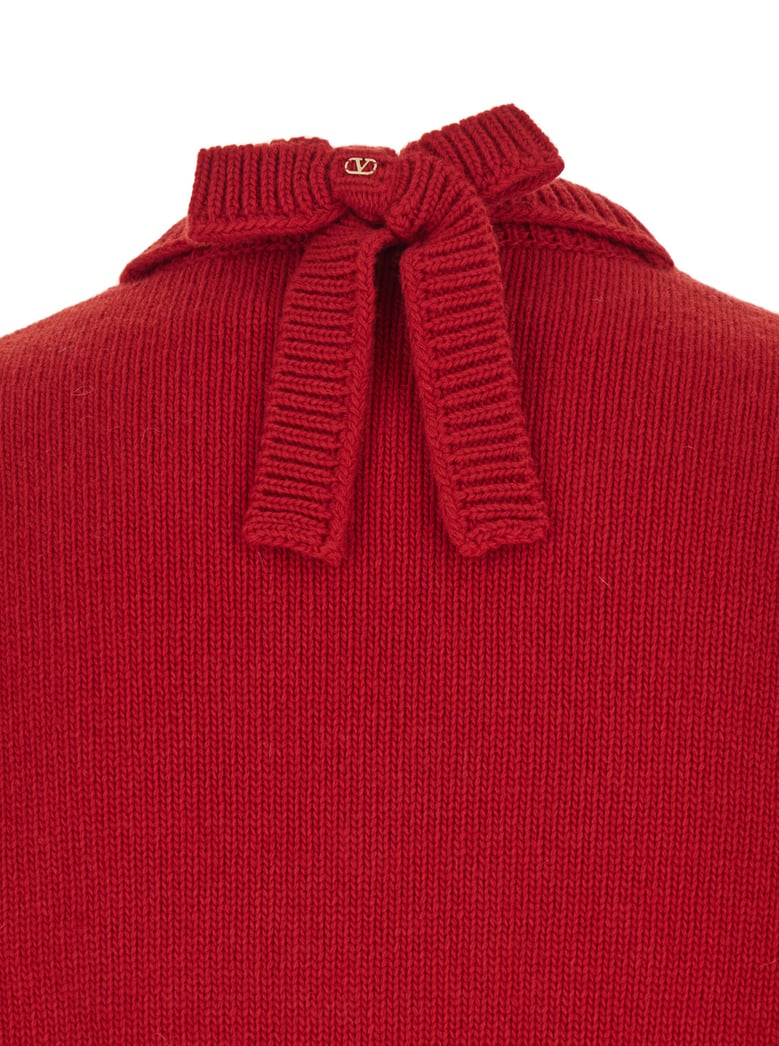 red v neck sweater with rear bow by Selfnex