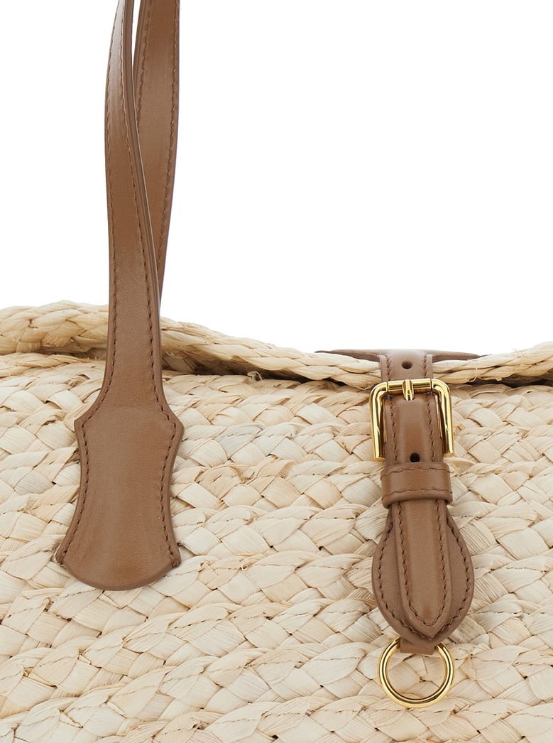 beige shoulder bag with interwoven design by Selfnex