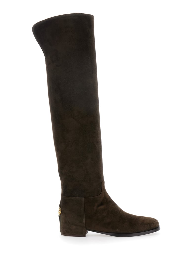 brown knee-high boots with logo plaque by Selfnex