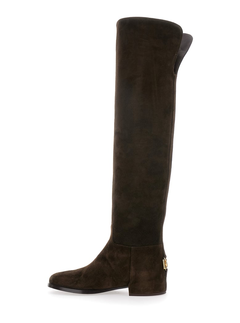 brown knee-high boots with logo plaque by Selfnex