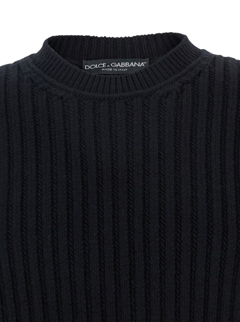 black ribbed knit crewneck sweater with logo patch by Selfnex