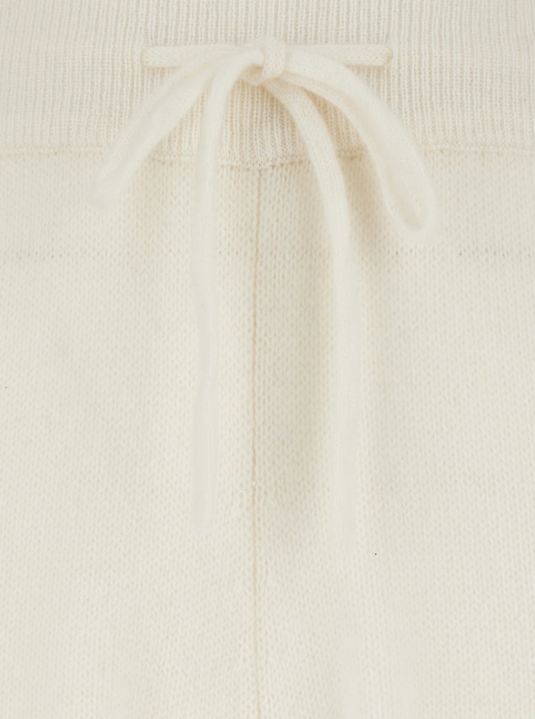 white cashmere pants with drawstring waist by Selfnex