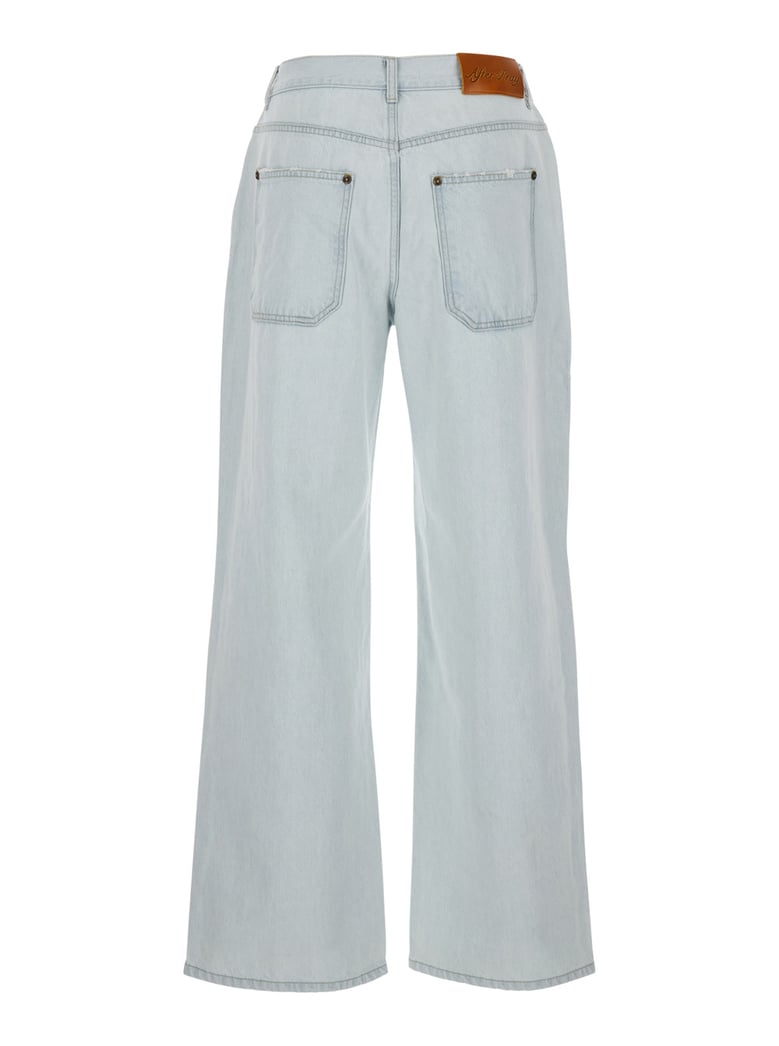 light blue jeans with ripped details by Selfnex