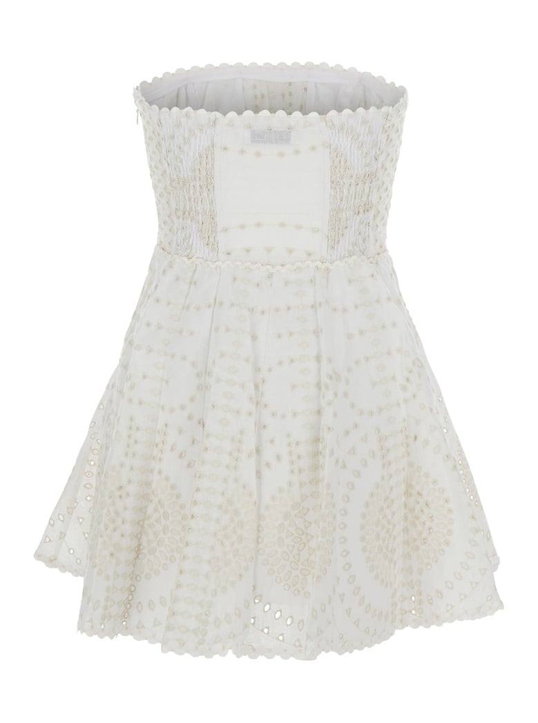 white dress with flounce skirt and embroidery by Selfnex
