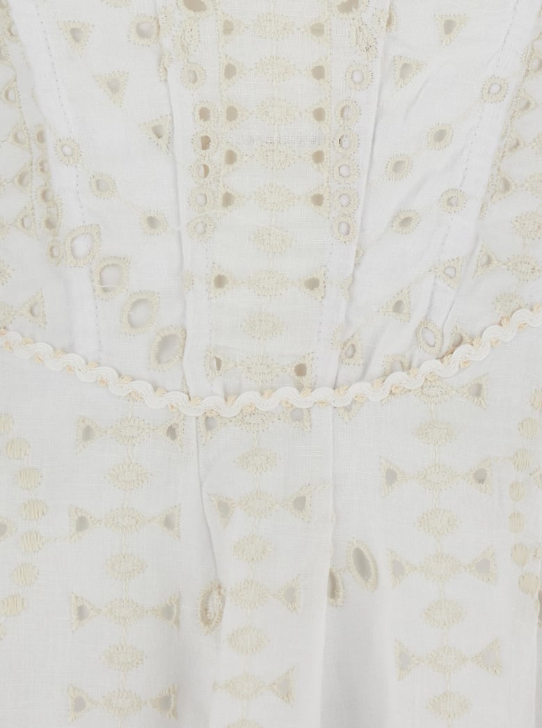 white dress with flounce skirt and embroidery by Selfnex