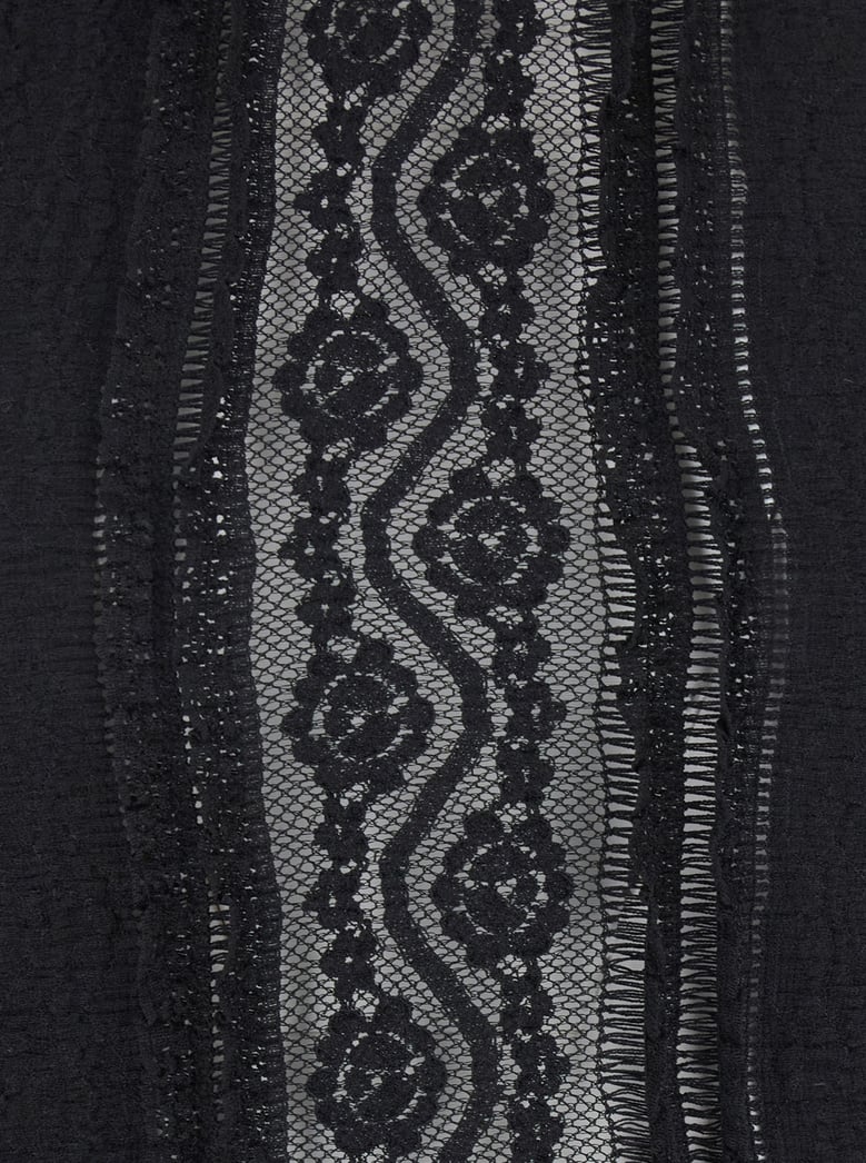 black top with embroidery details by Selfnex