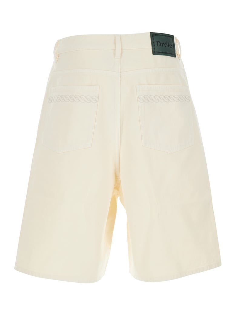 white wide leg shorts with logo patch by Selfnex