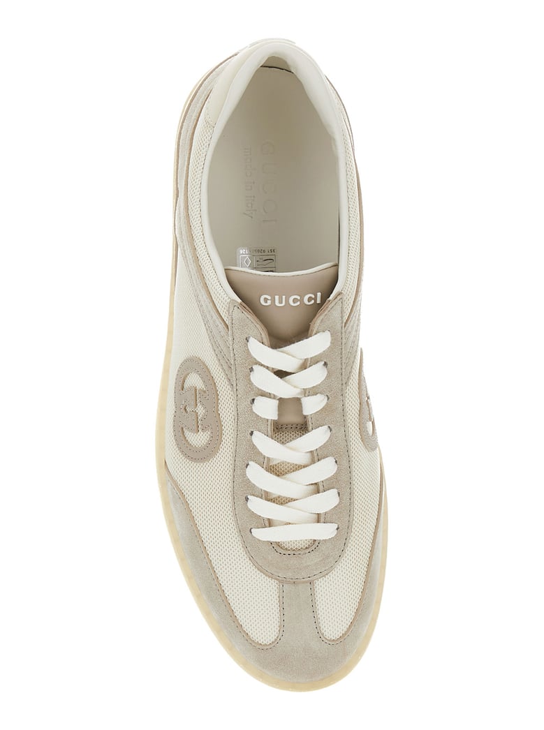 beige low top sneakers with logo patch by Selfnex