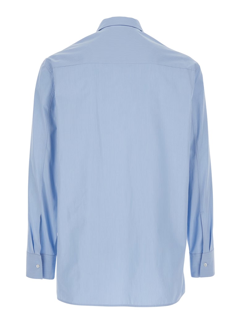 light blue pinstriped shirt with pointed collar by Selfnex
