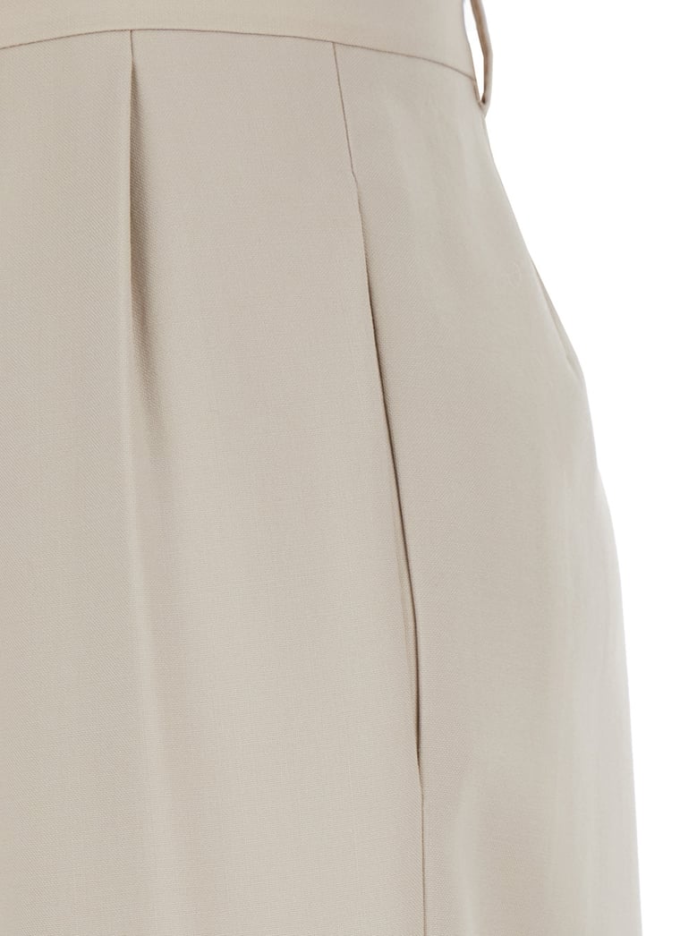 beige wool pants with belt loops by Selfnex