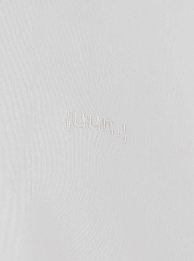 white t-shirt with tone-on-tone logo by Selfnex