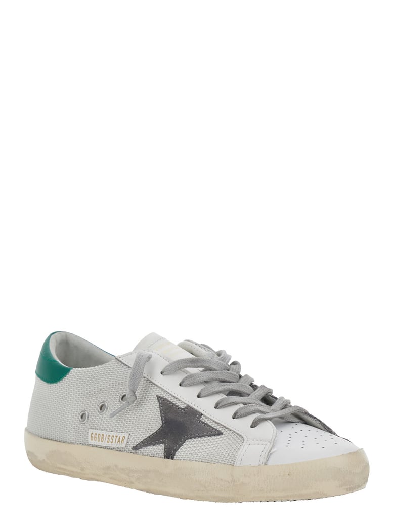 white low-top sneaker with star patch by Selfnex