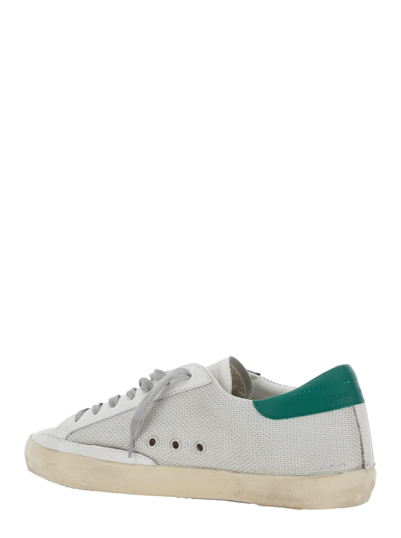 white low-top sneaker with star patch by Selfnex