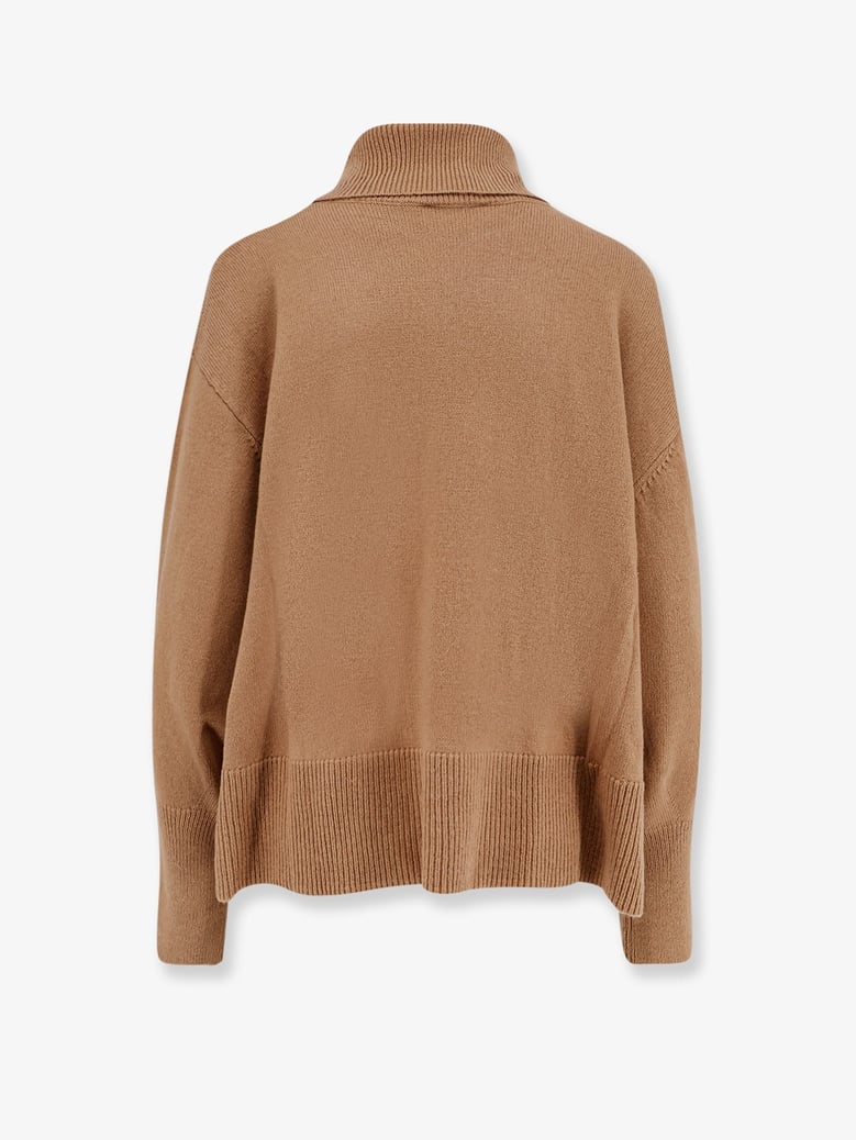 wool blend turtleneck sweater by Selfnex