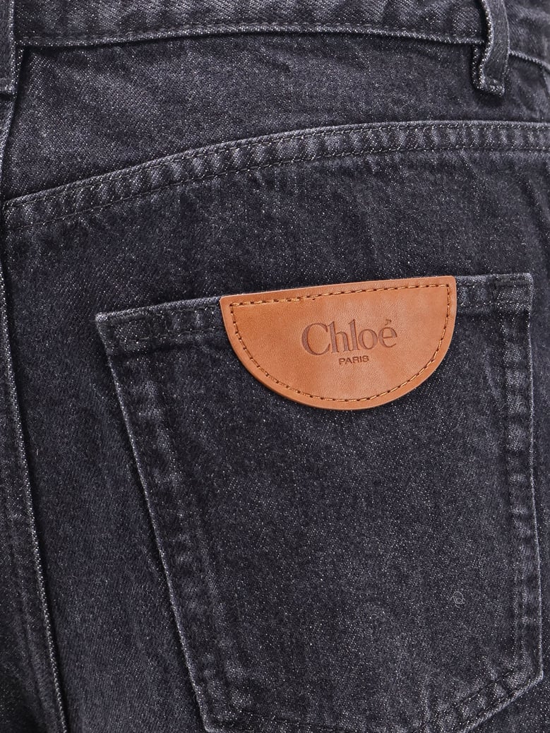 jeans with iconic leather logo tag by Selfnex