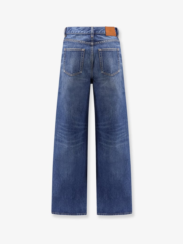 jeans with leather logo tag by Selfnex
