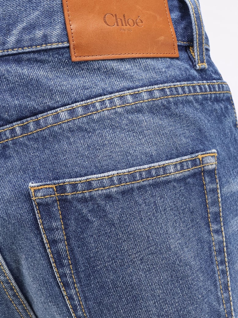 jeans with leather logo tag by Selfnex