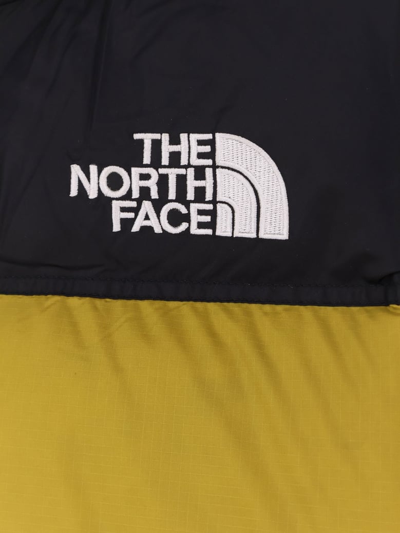 retro nuptse bicolor down jacket by Selfnex