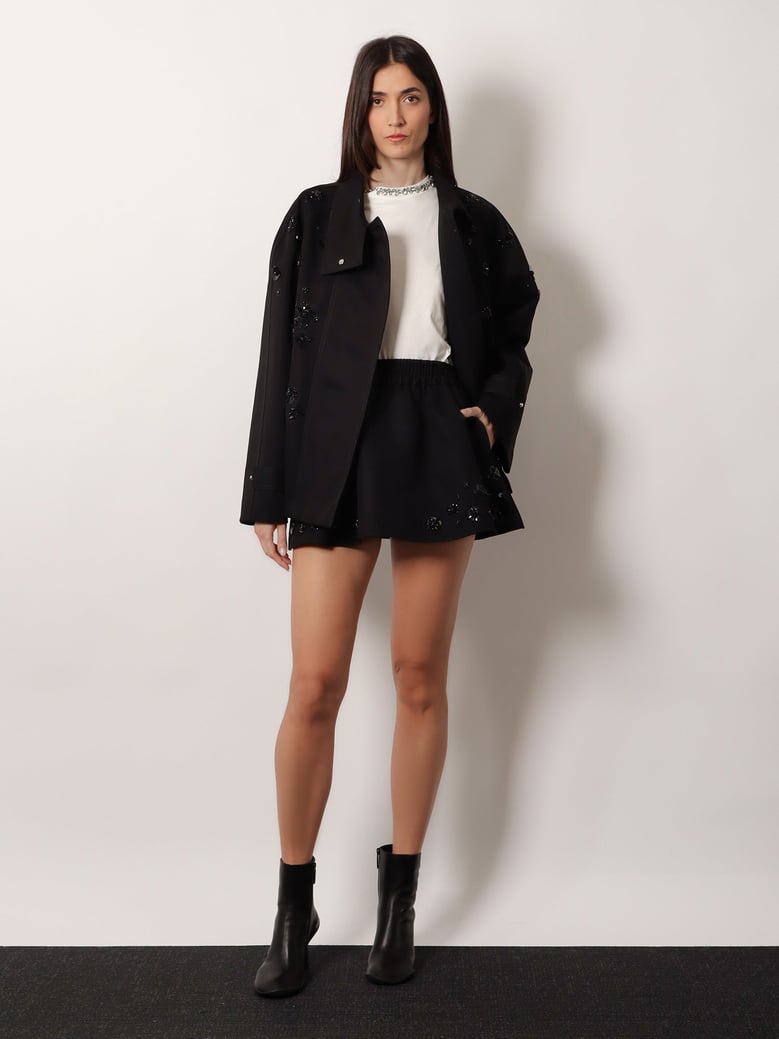 black denim jacket with floral sequin details by Selfnex