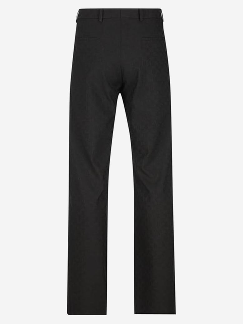 gg patterned wool blend trousers by Selfnex