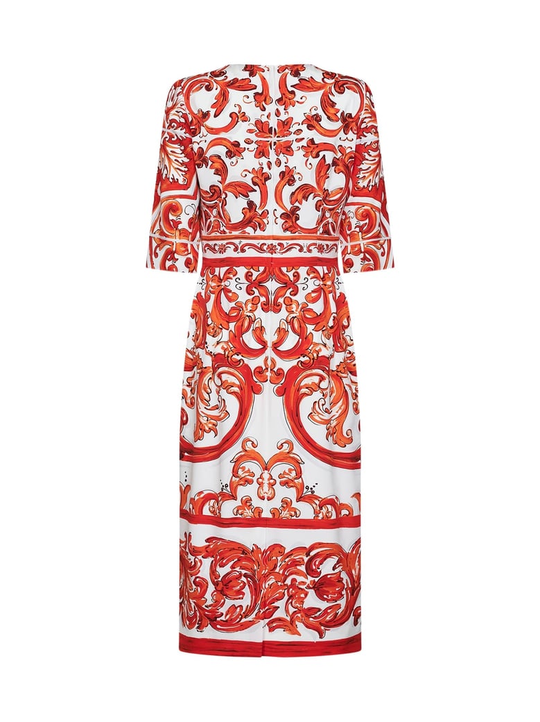 midi dress in orange maiolica print by Selfnex
