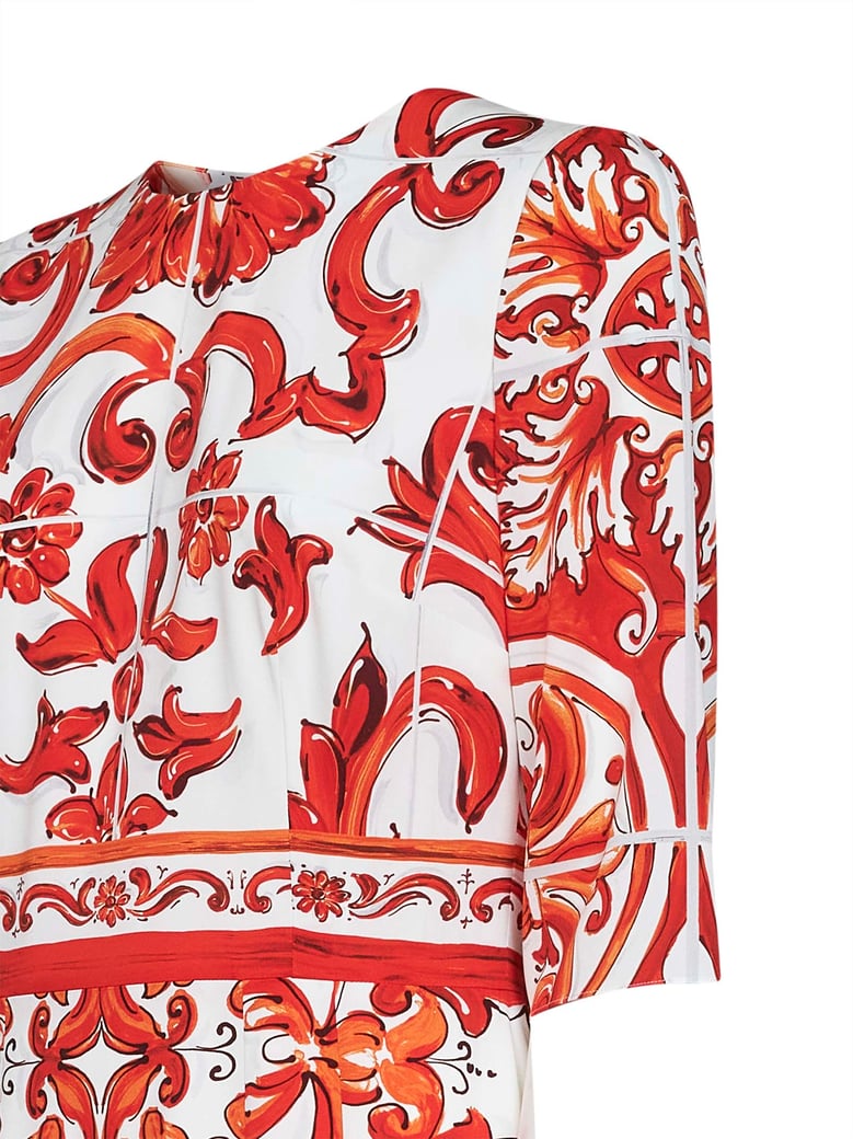 midi dress in orange maiolica print by Selfnex