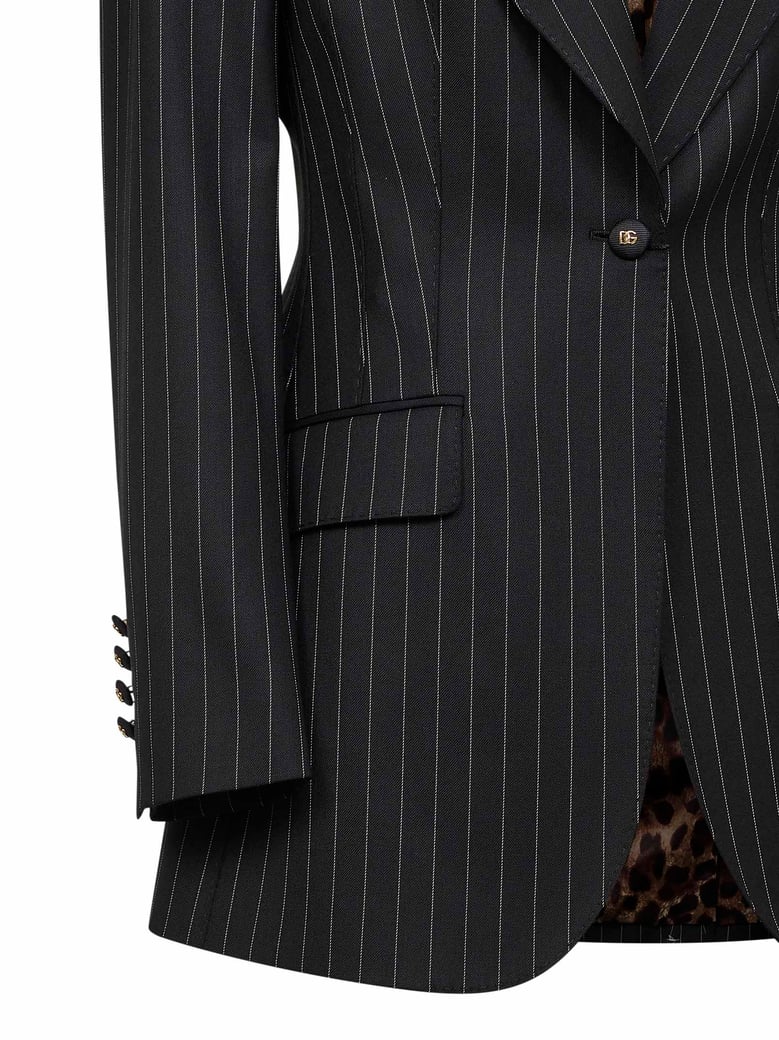 black pinstriped stretch wool jacket by Selfnex