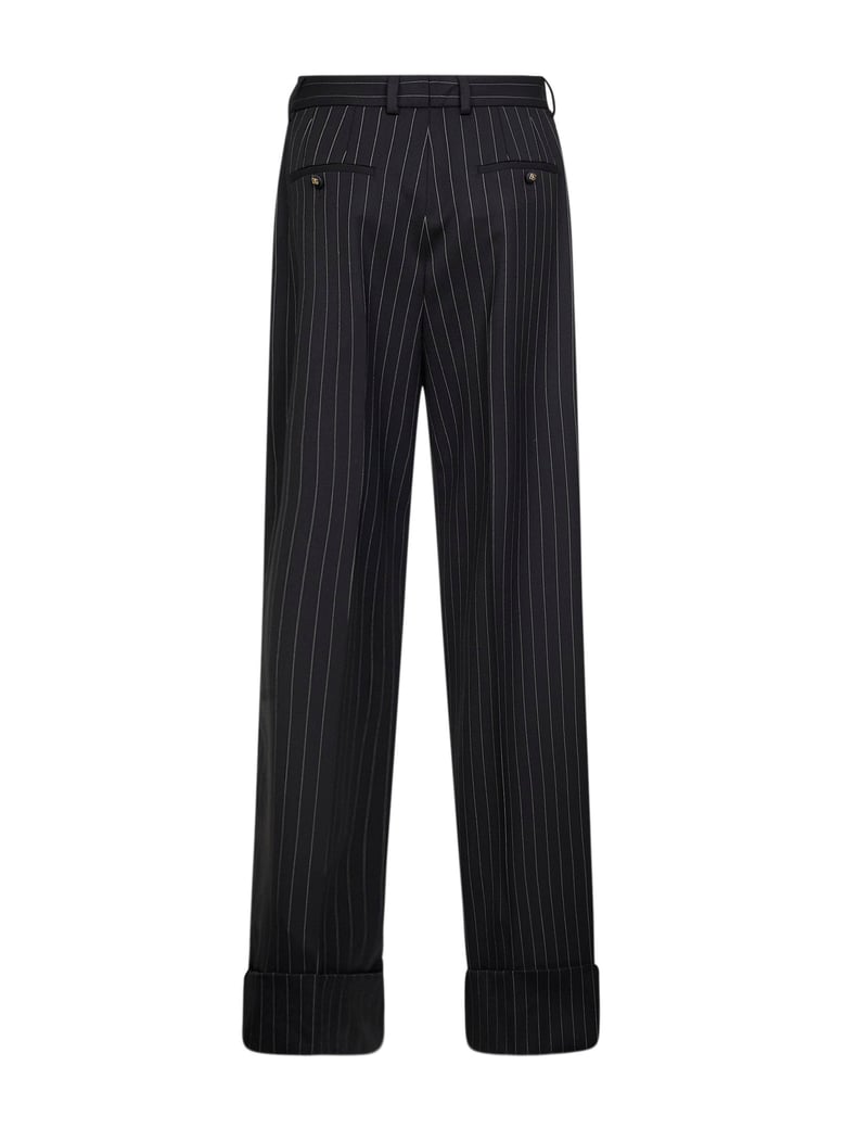 black two-way stretch twill pinstriped trousers by Selfnex