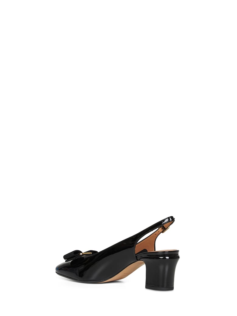 black vara bow slingback pumps by Selfnex