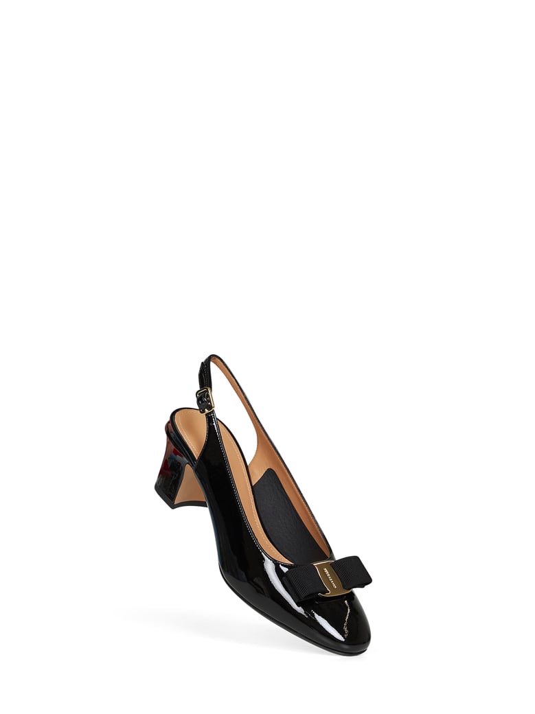 black vara bow slingback pumps by Selfnex
