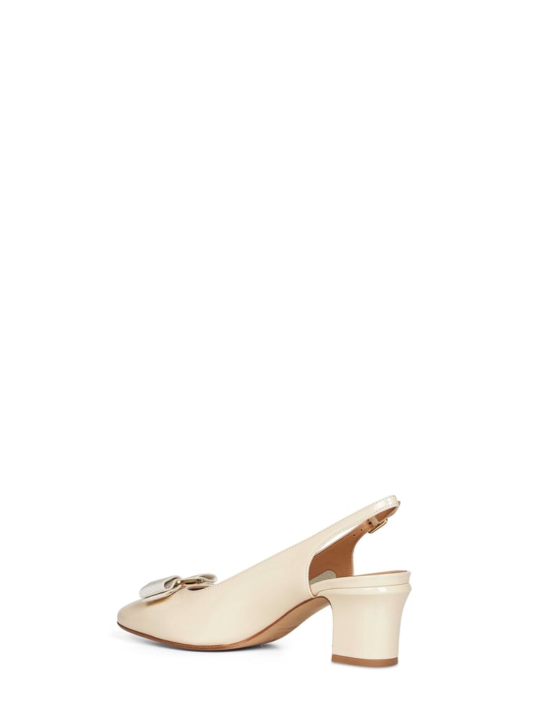 vara bow slingback pumps by Selfnex