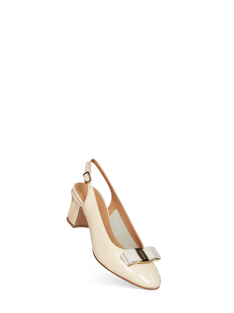 vara bow slingback pumps by Selfnex