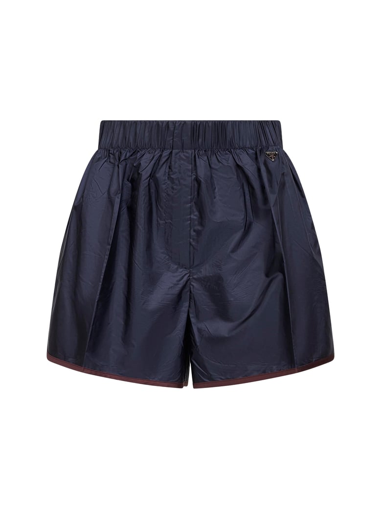 blue re-nylon shorts by Selfnex