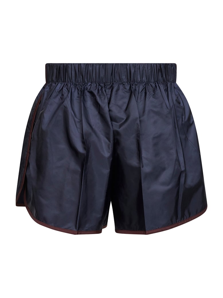 blue re-nylon shorts by Selfnex