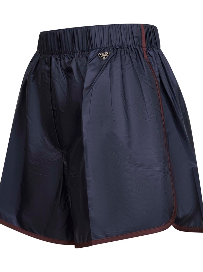 blue re-nylon shorts by Selfnex