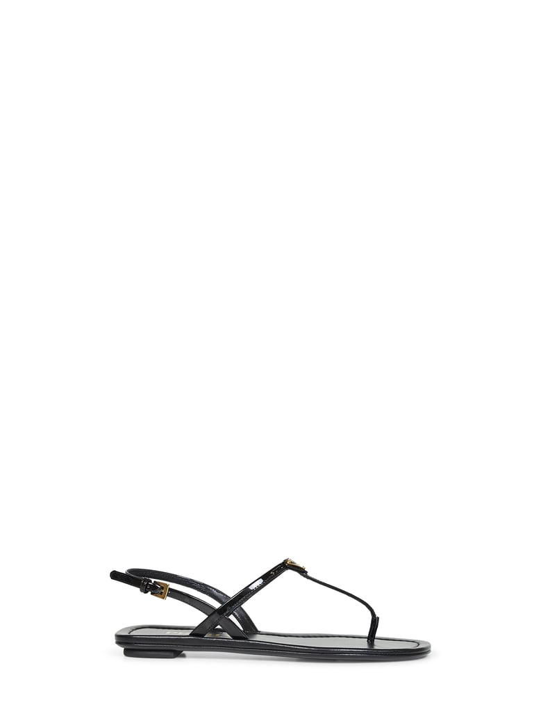 black patent leather thong sandals by Selfnex