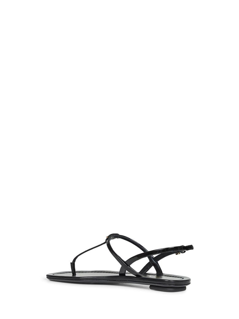 black patent leather thong sandals by Selfnex