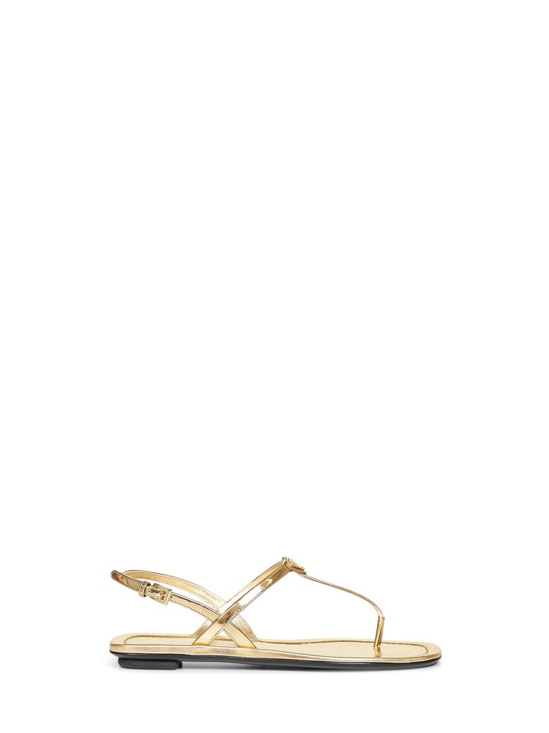 gold metallic leather thong sandals by Selfnex