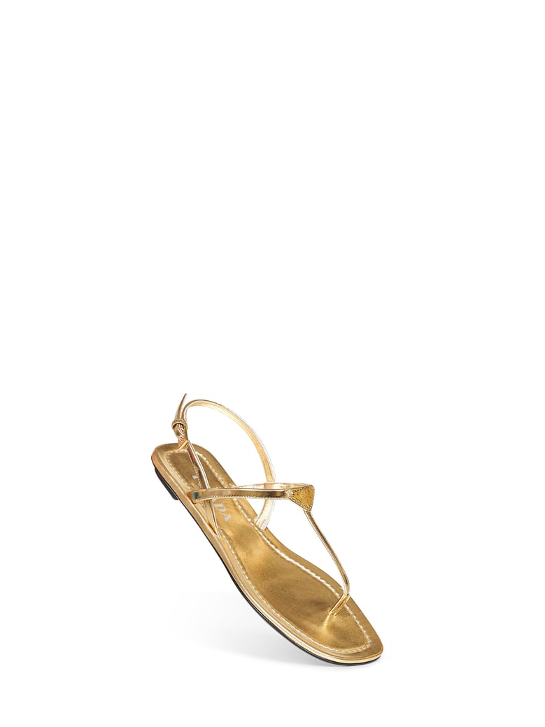 gold metallic leather thong sandals by Selfnex