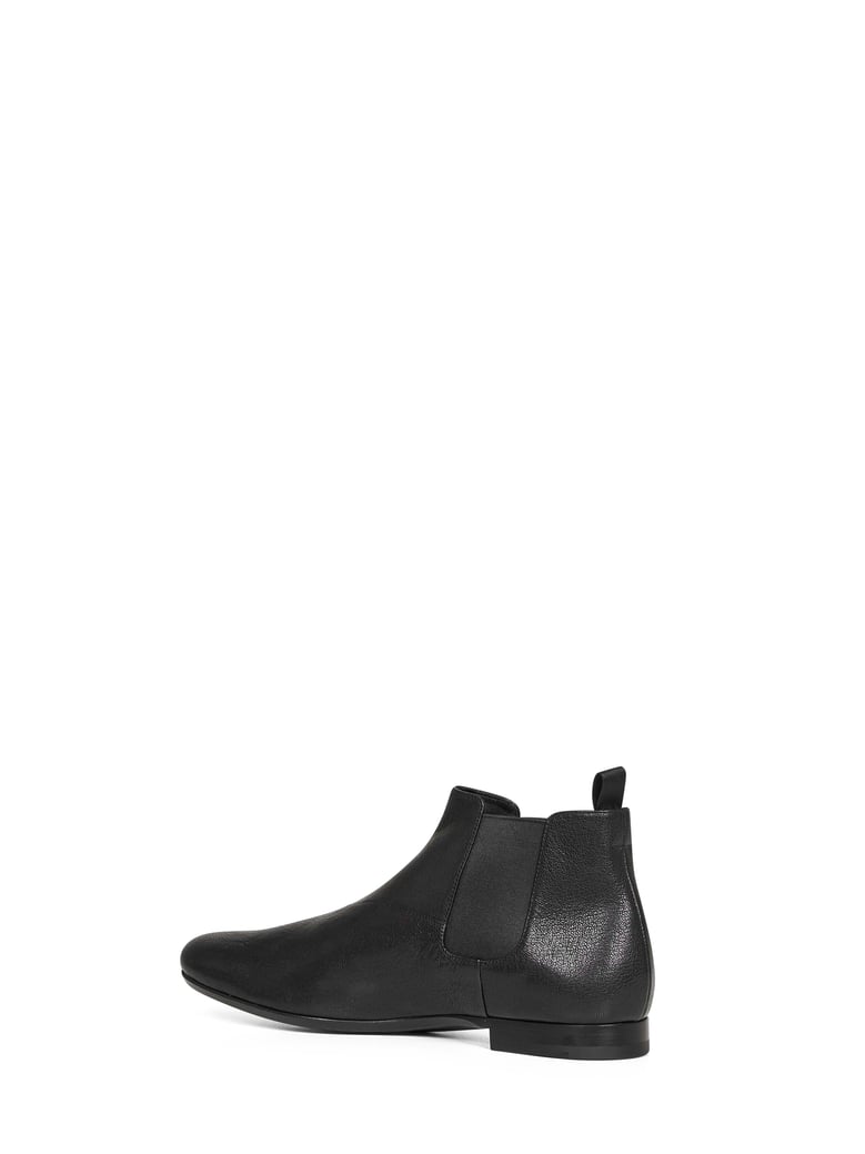 black leather chelsea boots by Selfnex