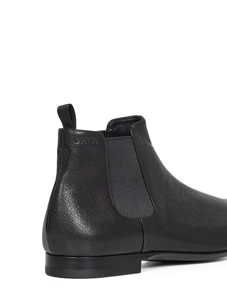 black leather chelsea boots by Selfnex