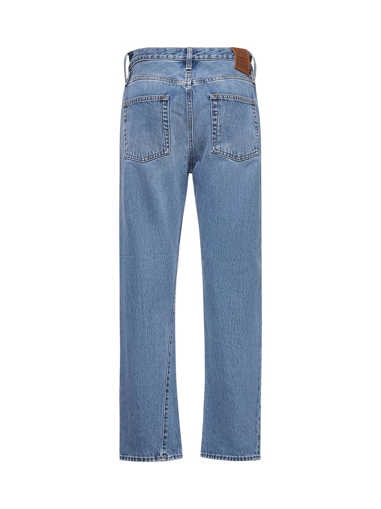 light blue denim twisted jeans by Selfnex